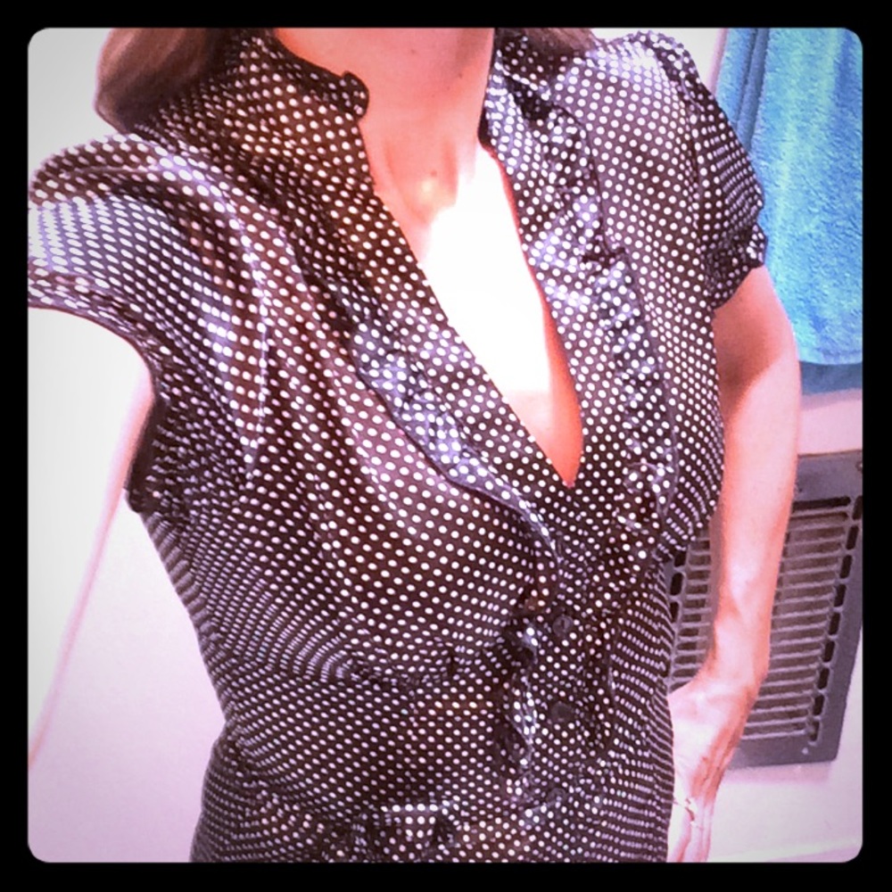 Polka dot blouse. Black and white.